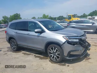 2019 Honda Pilot Elite with VIN 5FNYF6H08KB025449, listed as a IAAI auction lot 42450139 with 98,368 mi miles and . Bid and sale history available at DreamBid. Image 1.