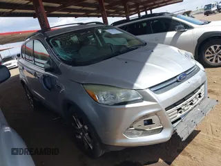 2013 Ford Escape SE with VIN 1FMCU0GX9DUB83512, listed as a IAAI auction lot 41970256 with 69,897 mi miles and . Bid and sale history available at DreamBid. Image 1.