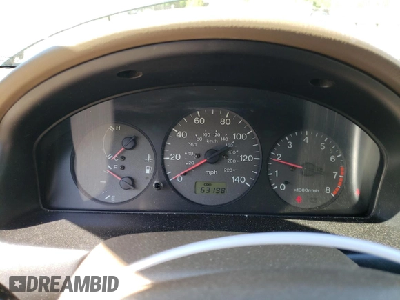 1999 Mazda Protege DX with VIN JM1BJ2223X0139775, listed as a Copart auction lot 54338455 with 63,198 mi miles and Salvage Title. Bid and sale history available at DreamBid. Image 9.