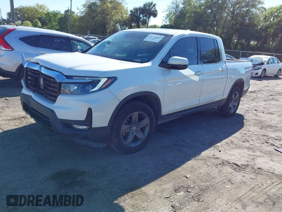 2021 Honda Ridgeline RTL-E with VIN 5FPYK3F7XMB011525, listed as a IAAI auction lot 41774012 with 98,031 mi miles and . Bid and sale history available at DreamBid. Image 17.