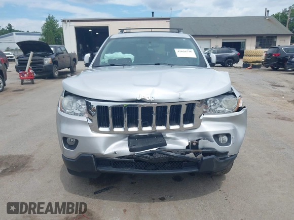 2011 Jeep Grand Cherokee Laredo with VIN 1J4RR4GG3BC734683, listed as a IAAI auction lot 42656716 with 151,220 mi miles and . Bid and sale history available at DreamBid. Image 6.