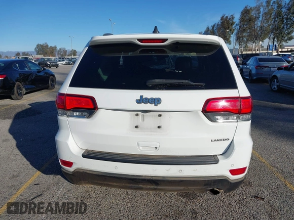 2021 Jeep Grand Cherokee Laredo X with VIN 1C4RJEAG2MC719395, listed as a IAAI auction lot 41338484 with 99,636 mi miles and . Bid and sale history available at DreamBid. Image 16.