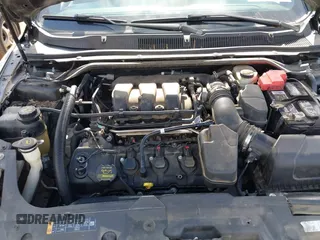 2014 Ford Taurus SEL with VIN 1FAHP2E81EG122928, listed as a IAAI auction lot 41492582 with 200,411 mi miles. Bid and sale history available at carsss.com. Image 10.