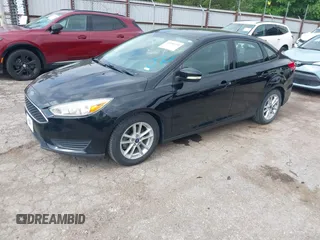 2016 Ford Focus SE z VIN 1FADP3F2XGL312445, wystawiony jako IAAI lot #42288210 z przebiegiem 64 115 mil mil oraz . Historia ofert i sprzedaży dostępna na DreamBid. Obrazek 2.