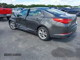2011 Kia Optima EX with VIN KNAGN4A74B5164311, listed as a IAAI auction lot 41558907 with Not Provided miles and . Bid and sale history available at carsss.com. Image 3.