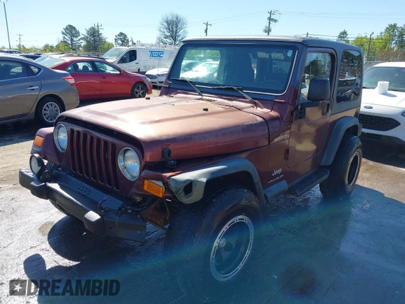 2003 Jeep Wrangler Sport with VIN 1J4FA49S33P345192, listed as a IAAI auction lot 41801344 with 196,472 mi miles. Bid and sale history available at carsss.com. Image 2.