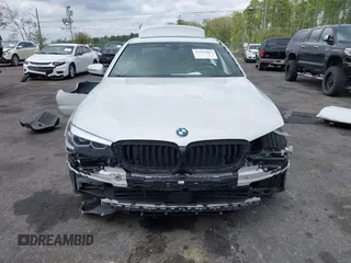 2018 BMW 5 Series 530i with VIN WBAJA5C55JWA38747, listed as a IAAI auction lot 41922937 with 100,951 mi miles and . Bid and sale history available at DreamBid. Image 12.