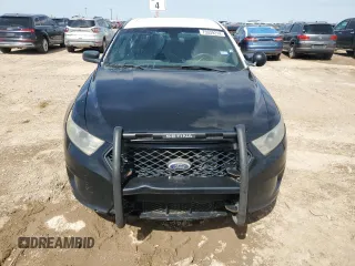 2014 Ford Police Interceptor with VIN 1FAHP2L81EG148870, listed as a Copart auction lot 73039214 with 255,800 mi miles and Salvage title. Bid and sale history available at DreamBid. Image 5.