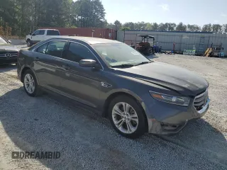 2015 Ford Taurus SEL with VIN 1FAHP2E88FG163929, listed as a Copart auction lot 51893325 with 200,553 mi miles and Clean Title. Bid and sale history available at carsss.com. Image 4.