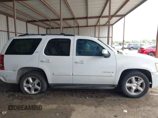 2007 Chevrolet Tahoe LT z VIN 1GNFC13097R131332, wystawiony jako IAAI lot #42113000 z przebiegiem 335 679 mil mil oraz . Historia ofert i sprzedaży dostępna na DreamBid. Obrazek 13.
