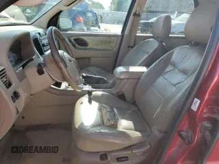 2006 Ford Escape Limited with VIN 1FMYU04116KA40963, listed as a Copart auction lot 61600525 with 208,696 mi miles and Salvage title. Bid and sale history available at DreamBid. Image 7.