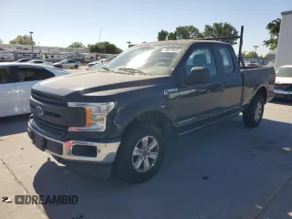 2018 Ford F-150 XL with VIN 1FTEX1EB2JKF61257, listed as a Copart auction lot 53674615 with 161,021 mi miles and Salvage title. Bid and sale history available at DreamBid. Image 1.