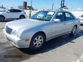 2002 Mercedes-Benz E-Class with VIN WDBJF65J82B447785, listed as a IAAI auction lot 41997147 with 74,433 mi miles. Bid and sale history available at carsss.com. Image 2.