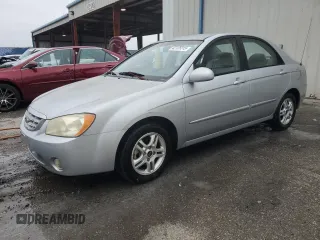 2004 Kia Spectra LX with VIN KNAFE121X45010855, listed as a Copart auction lot 42125315 with 150,795 mi miles and Salvage Title. Bid and sale history available at carsss.com. Image 1.
