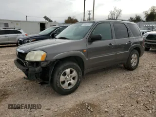 2003 Mazda Tribute LX with VIN 4F2YZ04173KM39426, listed as a Copart auction lot 82664104 with Not Provided miles and Salvage Title. Bid and sale history available at DreamBid. Image 1.