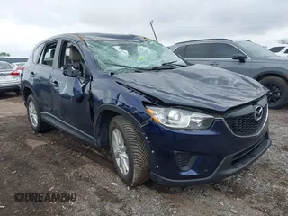 2013 Mazda CX-5 Sport with VIN JM3KE2BE1D0160254, listed as a IAAI auction lot 42256555 with 136,476 mi miles and . Bid and sale history available at DreamBid. Image 1.