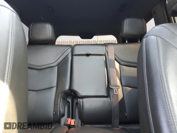 2020 Cadillac XT6 FWD Premium Luxury с VIN 1GYKPCRSXLZ174002, выставлен на аукционе Copart как лот 52083235 с пробегом 79 712 миль миль и Списание • Salvage title. История ставок и продаж доступна на DreamBid. Изображение 10.