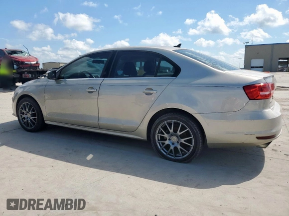 2015 Volkswagen Jetta SE z VIN 3VWD07AJ6FM252596, wystawiony jako Copart lot #62223885 z przebiegiem 140 885 mil mil oraz Czysty tytuł • Clean title. Historia ofert i sprzedaży dostępna na DreamBid. Obrazek 2.