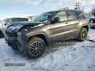 2018 Jeep Grand Cherokee Trailhawk with VIN 1C4RJFLTXJC130221, listed as a Copart auction lot 85953804 with 106,640 mi miles and Clean Title. Bid and sale history available at carsss.com. Image 1.