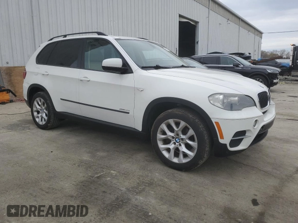 2011 BMW X5 35i z VIN 5UXZV4C54BL402434, wystawiony jako Copart lot #52797515 z przebiegiem 181 109 mil mil oraz Czysty tytuł • Clean title. Historia ofert i sprzedaży dostępna na DreamBid. Obrazek 4.