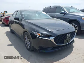 2021 Mazda 3 S with VIN JM1BPAAL6M1318840, listed as a IAAI auction lot 42062897 with 51,210 mi miles and . Bid and sale history available at DreamBid. Image 1.