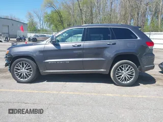 2017 Jeep Grand Cherokee Summit with VIN 1C4RJFJT9HC759417, listed as a IAAI auction lot 42199460 with 129,113 mi miles and . Bid and sale history available at DreamBid. Image 15.