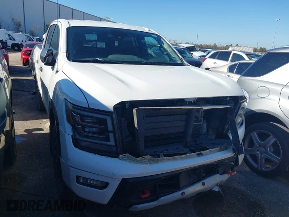 2021 Nissan Titan Pro-4X with VIN 1N6AA1ED5MN533759, listed as a IAAI auction lot 41203812 with 39,154 mi miles and . Bid and sale history available at DreamBid. Image 1.