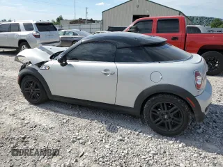 2013 MINI Coupe S z VIN WMWSX3C5XDT466209, wystawiony jako Copart lot #67072444 z przebiegiem 145 900 mil mil oraz Szkody całkowita. Historia ofert i sprzedaży dostępna na DreamBid. Obrazek 2.