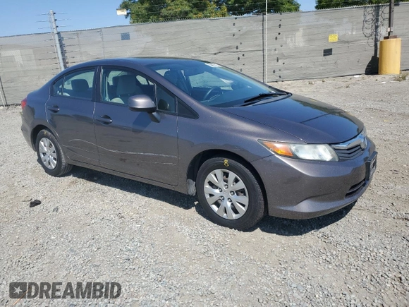 2012 Honda Civic LX z VIN 2HGFB2F5XCH517276, wystawiony jako Copart lot #59443775 z przebiegiem 98 749 mil mil oraz Szkoda całkowita • Salvage title. Historia ofert i sprzedaży dostępna na DreamBid. Obrazek 4.