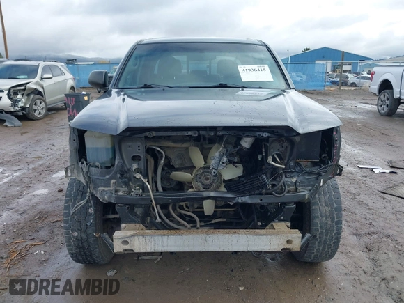 2013 Toyota Tacoma with VIN 3TMLU4EN7DM113315, listed as a IAAI auction lot 41938415 with 228,912 mi miles and . Bid and sale history available at DreamBid. Image 6.