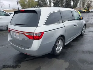 2012 Honda Odyssey Touring with VIN 5FNRL5H99CB055499, listed as a IAAI auction lot 41916534 with 278,435 mi miles. Bid and sale history available at carsss.com. Image 4.