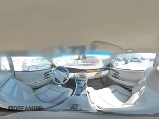 1998 Cadillac Eldorado z VIN 1G6EL12YXWU610918, wystawiony jako Copart lot #57309075 z przebiegiem 168 228 mil mil oraz Szkoda całkowita • Salvage title. Historia ofert i sprzedaży dostępna na DreamBid. Obrazek 14.