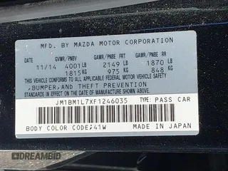 2015 Mazda 3 i Touring with VIN JM1BM1L7XF1246035, listed as a IAAI auction lot 41819595 with 124,535 mi miles and . Bid and sale history available at carsss.com. Image 9.