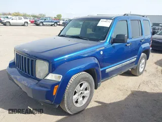 2010 Jeep Liberty Sport with VIN 1J4PN2GK1AW177393, listed as a IAAI auction lot 41948214 with 171,792 mi miles. Bid and sale history available at carsss.com. Image 2.