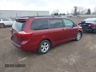 2016 Toyota Sienna LE AAS with VIN 5TDKK3DC0GS751907, listed as a IAAI auction lot 41831340 with 100,610 mi miles. Bid and sale history available at carsss.com. Image 4.