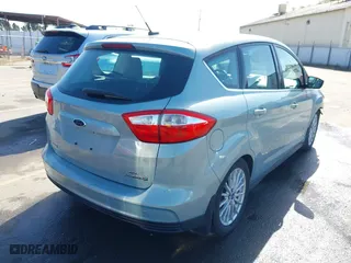 2013 Ford C-Max Hybrid SEL with VIN 1FADP5BUXDL521814, listed as a IAAI auction lot 41944352 with 130,999 mi miles. Bid and sale history available at carsss.com. Image 4.