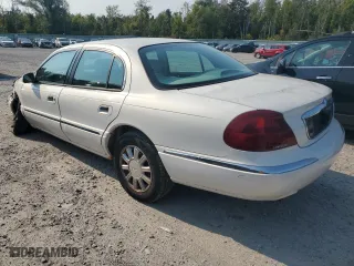 2001 Lincoln Continental with VIN 1LNHM97V91Y659769, listed as a Copart auction lot 71220804 with 0 mi miles and Salvage Title. Bid and sale history available at carsss.com. Image 2.