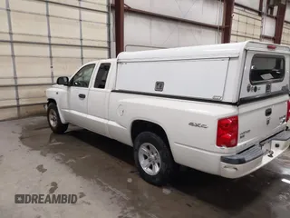 2009 Dodge Dakota Bighorn/Lonestar with VIN 1D3HW32P79S819674, listed as a IAAI auction lot 41962369 with 157,399 mi miles and . Bid and sale history available at carsss.com. Image 3.