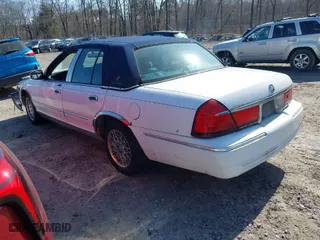 2001 Mercury Grand Marquis GS with VIN 2MEFM74W41X687586, listed as a IAAI auction lot 41778136 with 122,596 mi miles. Bid and sale history available at carsss.com. Image 3.