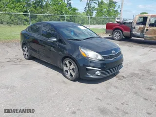 2016 Kia Rio EX with VIN KNADN4A34G6575984, listed as a IAAI auction lot 42133630 with 126,704 mi miles. Bid and sale history available at carsss.com. Image 1.