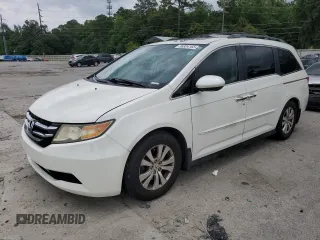 2014 Honda Odyssey EX-L with VIN 5FNRL5H6XEB129005, listed as a Copart auction lot 58804165 with 157,795 mi miles and Salvage title. Bid and sale history available at DreamBid. Image 1.