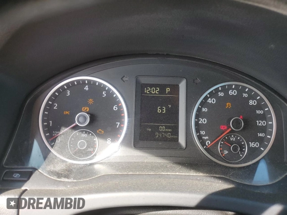 2010 Volkswagen Tiguan S with VIN WVGAV7AX9AW519312, listed as a Copart auction lot 48633055 with 94,740 mi miles and Salvage title. Bid and sale history available at DreamBid. Image 9.