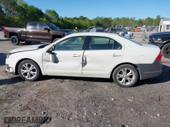 2012 Ford Fusion SE with VIN 3FAHP0HA9CR402640, listed as a IAAI auction lot 42052610 with 210,441 mi miles and . Bid and sale history available at carsss.com. Image 14.