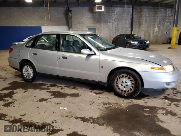 2002 Saturn LS z VIN 1G8JS54F32Y553699, wystawiony jako Copart lot #52019935 z przebiegiem 2513 mil mil oraz Szkody całkowita. Historia ofert i sprzedaży dostępna na DreamBid. Obrazek 4.