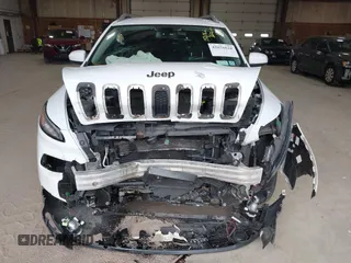 2014 Jeep Cherokee Altitude with VIN 1C4PJMCB7EW186432, listed as a IAAI auction lot 42076018 with 150,186 mi miles and . Bid and sale history available at DreamBid. Image 6.