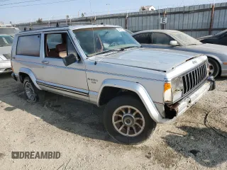 1985 Jeep Cherokee с VIN 1JCWB7742FT144063, выставлен на аукционе Copart как лот 84050844 с пробегом 80 072 миль миль и Чистый • Clean title. История ставок и продаж доступна на DreamBid. Изображение 4.