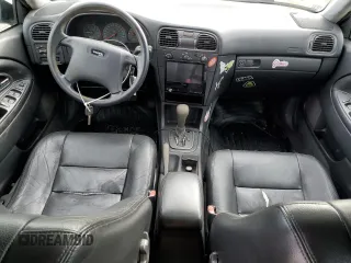 2001 Volvo V40 z VIN YV1VW29581F738166, wystawiony jako Copart lot #86166264 z przebiegiem 83 518 mil mil oraz Tytuł czysty. Historia ofert i sprzedaży dostępna na DreamBid. Obrazek 8.