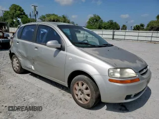 2005 Chevrolet Aveo LS with VIN KL1TD62665B359524, listed as a Copart auction lot 64398555 with 166,819 mi miles and Salvage title. Bid and sale history available at DreamBid. Image 4.