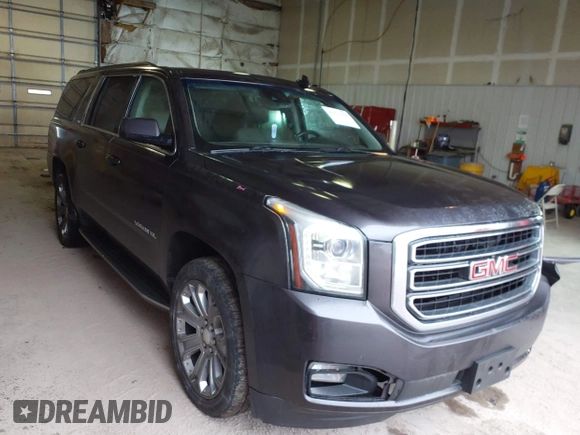 2015 GMC Yukon XL SLT with VIN 1GKS2HKC6FR667110, listed as a IAAI auction lot 41472250 with 141,383 mi miles. Bid and sale history available at carsss.com. Image 1.