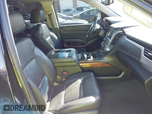 2020 Chevrolet Tahoe LTZ with VIN 1GNSCCKCXLR106732, listed as a IAAI auction lot 41486660 with Not provided miles and . Bid and sale history available at DreamBid. Image 5.